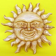 Lachende Sonne, Lindenholzrelief